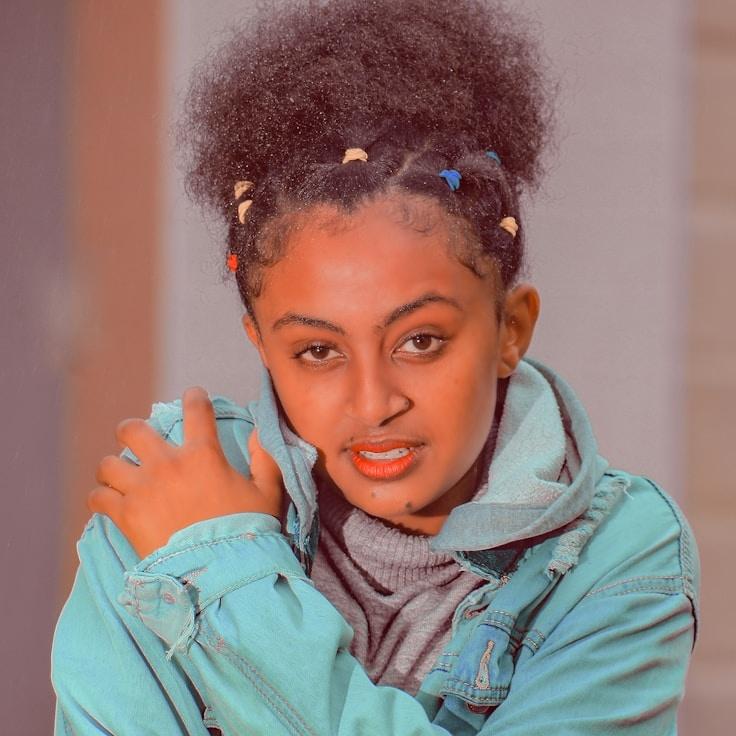 Ava Rivera, Lead Design Curator at Ventra Solivix, reviewing corporate floral arrangements